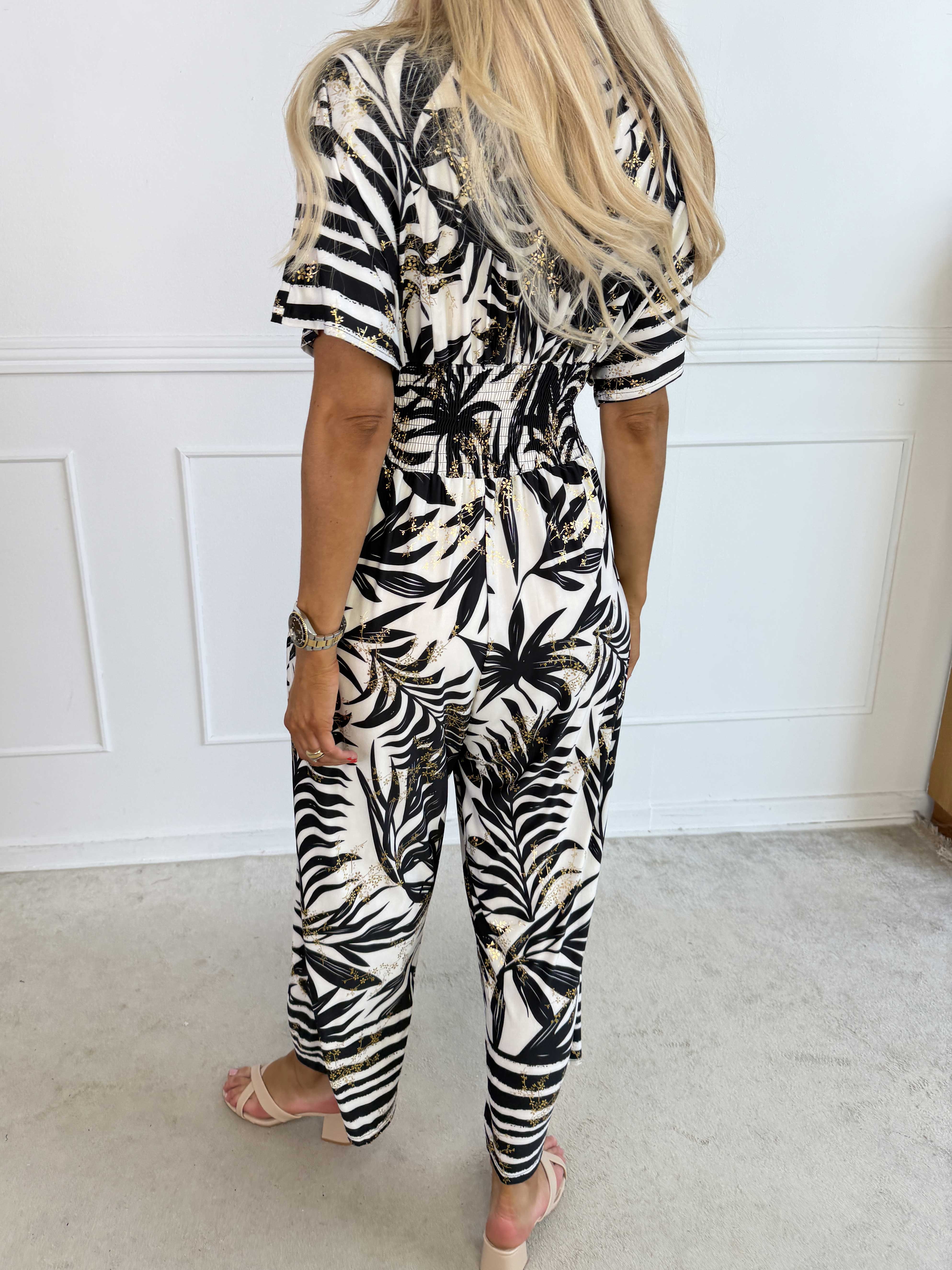 Pams Palm Jumpsuit - Elastisk buksedragt med palmeprint